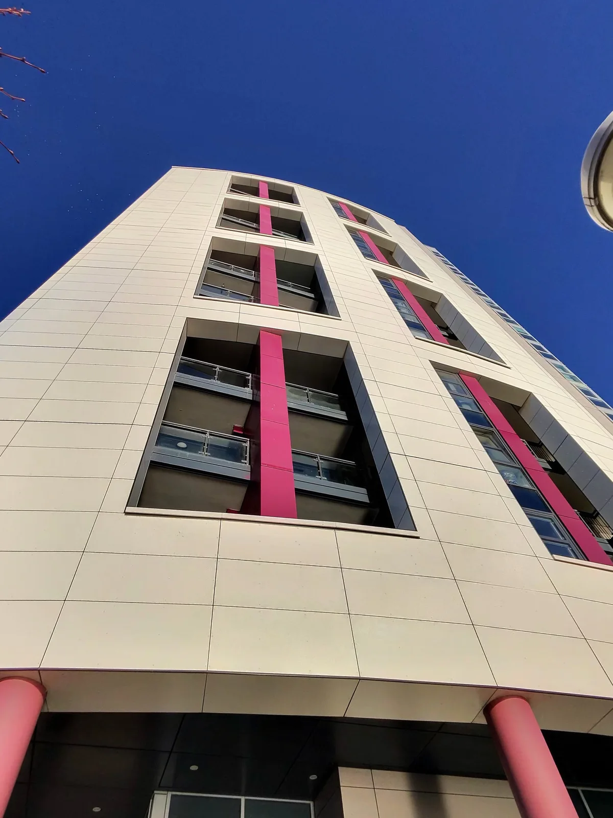 Rainscreen façade against a blue sky, from Evgheni’s personal installation archive