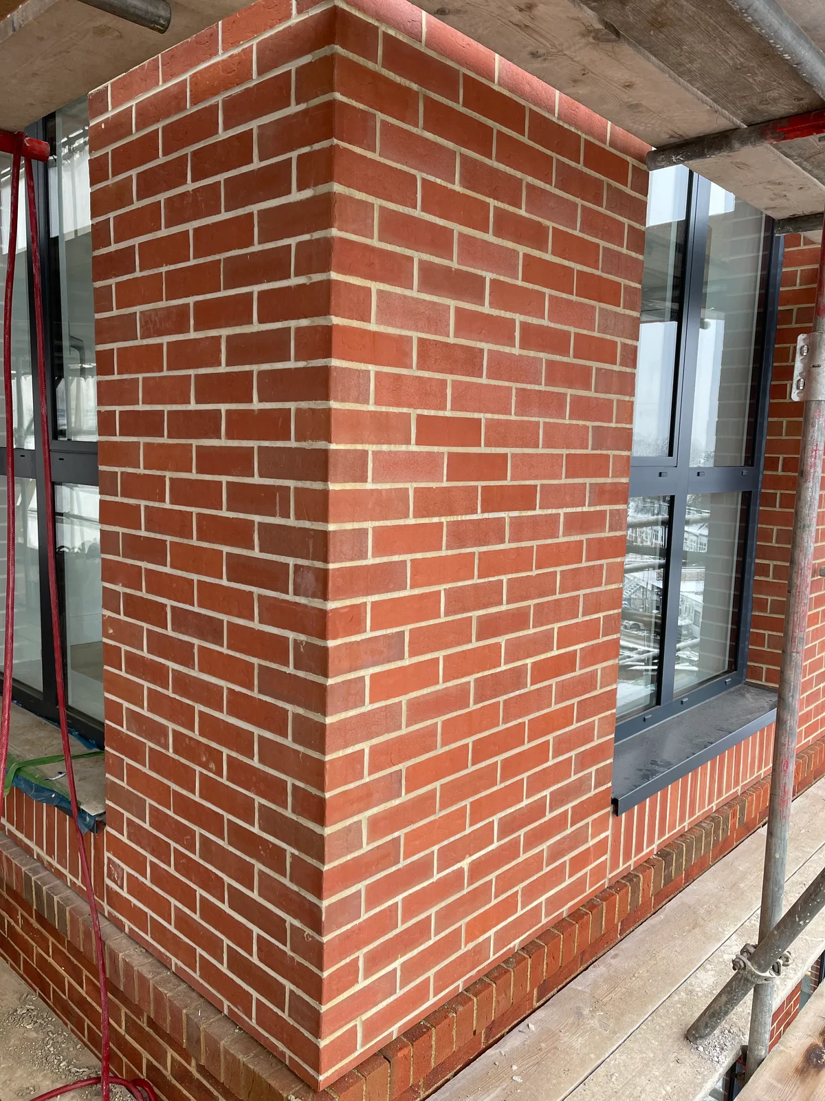 Close view of brick-slip corner and joints from earlier installation experience